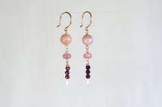 "Beautiful dangle earrings featuring a beautiful combination of high quality gemstones. 🔆 2 - Sunstone Bead - 8-9 mm Round 🔆 2 Rose Pink Crackle Crystal Rondelles - 4x6 mm  🔆 6 Rubies - 3.5 mm Faceted Round 🔆 Hand-forged and Hammered Ear Wire    Listing is for EARRINGS only. Matching Necklace can be found here: https://www.etsy.com/BeHeldStudio/listing/1439126872/sunstone-and-ruby-necklace-satellite?utm_source=Copy&utm_medium=ListingManager&utm_campaign=Share&utm_term=so.lmsm&share_time=1680495483286 PACKAGING 🔆 Comes packaged in a gift box with care instructions. 🔆 Orders with multiple pieces will be shipped in ONE BOX 🔆 If you are ORDERING GIFTS and need a box for each piece, please request this in the Notes section at Checkout. MATERIALS 🔆 GOLD-FILLED (hypoallergenic) Gold fill Dangle Earrings Gold, Ruby Crystal, Ruby Necklace, Gift Graduation, Solid Gold Jewelry, Crystal Drop Earrings, Crystal Drop, Gold Earrings Dangle, Matching Necklaces