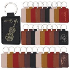 a set of six leather keychains with different colors and designs on each one