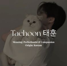 a woman holding a white cat in her arms with the caption taeshon