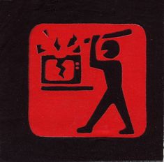 a red and black sticker with a man holding a tv in it's hand