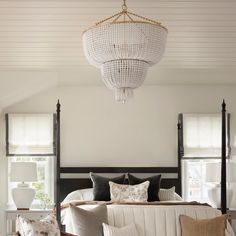 This two-tier, non-traditional chandelier combines the classic lighting style from the 1920s with a modern simplicity. Pretty and strong. Available in two finishes with your choice of acrylic or clear beadwork. Details & Dimensions Fixture Height: 38" Width: 32.25" Canopy: 7" Round Socket: 12 - E12 Candelabra Wattage: 12 - 60 C11 Weight: 57 pounds Bulb Recommendation: Candelabra Bulb 4 Watt Clear LED Dimmable E12 2700K Monika Hibbs, Classic Lighting, Jar Lanterns, Ring Chandelier, Small Chandelier, Arm Chandelier, Lighting Home, Traditional Chandelier, Linear Lighting