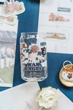 OFFICIALLY LICENSED BY AUBURN UNIVERSITY 16 oz full color glass cup featuring important Auburn icons, such as Aubie, Samford Hall, Jordan-Hare Stadium, Neville arena, and more! Dishwasher safe Auburn University, Glass Cup, Auburn, Dishwasher Safe, Jordan, University, Glass, Color