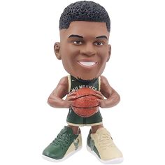 a bobble head that is holding a basketball