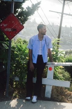 A vintage-inspired loose summer shirt with a boxy cut and a slight crop at the waist. For the likes of Tom Ripley, for the days with nothing planned. Constructed in a crisp pima cotton with double front placket pockets, this button-up offers the ultimate summer ease. Wear open or closed and year-around in Southern California. Mens Blue Shirt, Blue Shirt, Blue Man