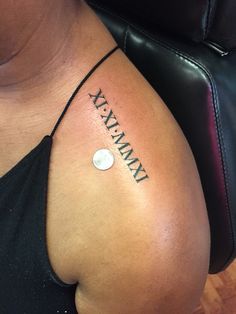 a woman with a tattoo on her arm that says, mama y'all in cursive writing