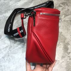 Description BLNCG Sling Bag In Red, For Women, Bags 9.1in/23cm Rep 1:1 Size: 23 x 22 x 14 cm/ 9.1 x 8.7 x 5.5 inches (Length x Height x Width) Xs souvenir BLNCG bag Can be worn at the waist or cross body style Mixed finish charms at the chain and strap. Includes box, dust bag. This product is of the best quality. Cheap Functional Red Bag, Cheap Red Sporty Bag, Cheap Red Pouch Shoulder Bag, Cheap Red Baguette Bag For Travel, Luxury Products, Balenciaga Bag, Body Style, Sling Bag, Satchel Bags