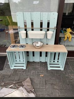 an outdoor kitchen made out of wooden pallets