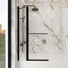 a bathroom with marble walls and flooring next to a walk in shower that has glass doors