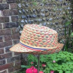 Straw Trilby. Pink and green with Multicoloured Petersgam stripe band. Natural imperfections in the straw with small breaks, scuffs and light stains consistent with age and use.  Size medium - 56cm-57cm Please check your head measurement before you buy! If you need advice on how best to measure your head, please get in touch. I post U.K. 1st class signed for / international tracked and signed. I refund any difference in postage.  I ship worldwide. Please contact me for a shipping quote if your destination is not listed. Buyer pays any additional import duties / taxes.  If you are unhappy with your purchase. please contact me on receipt to discuss. Buyer pays return postage. Spring Beach Flat Cap, Green Flat Cap For Summer, Green Summer Flat Cap, Retro Summer Hats For Country Events, Vintage Flat Cap Hats For Summer, Casual Flat Cap Straw Hat For Summer, Casual Striped Brimmed Straw Hat, Retro Brimmed Summer Fedora, Retro Brimmed Fedora For Summer