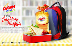 an advertisement for dawn lunchtime is shown with sandwiches and fruit in a red container