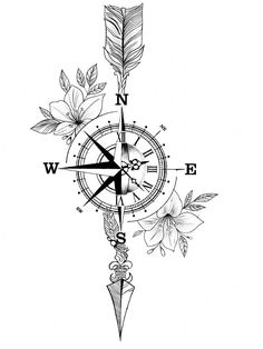 a compass with flowers and leaves on it