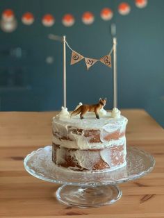 a cake with frosting and decorations on it