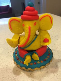 an elephant figurine sitting on top of a table