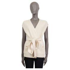 100% authentic Chanel Pre-Fall 2018 belted sleeveless knit cardigan in off-white cashmere (100%). Features two shut sewn 'CC' buttoned slit pockets on the front. Unlined. Has been worn and is in excellent condition. Matching pants available in separate listing. Measurements Tag Size 40 Size M Bust 104cm (40.6in) to 130cm (50.7in) Waist 108cm (42.1in) to 140cm (54.6in) Hips 110cm (42.9in) to 144cm (56.2in) Length 65cm (25.4in) All our listings include only the listed item unless otherwise specifi Chanel Cardigan, Sleeveless Cardigan, Sleeveless Knit, Matching Pants, Fall 2018, Knit Sweater Cardigan, Pre Fall, Cardigan Sweater, Knit Cardigan