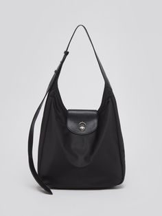 Composition : Outer Fabric: 100% Nylon/ Inner Skin: 100% Polyester/ Strap: 100% Synthetic LeatherCountry of Origin : CHINA Nylon Bag, Bag Lady, Shoulder Bag, The Originals, Black