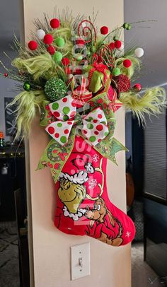 a christmas stocking hanging from the side of a wall