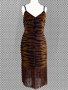 Rare Mario Borsato Couture silk cocktail dress with tiger pattern. Excellent condition. Size 12, fits M. Bust 88 cm, waist 73 cm, hips 96 cm No composition tags. Tiger Chiffon Dress, Tiger Stripe Party Dress, Tiger Midi Dress, Tiger Paint Dresses, Tiger Cocktail Dress, Animal Formal Dress, Tiger Sequin Dress, Tiger Stripe Formal Dress, Unique Prom Themes