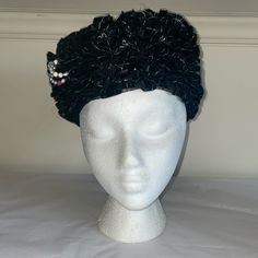 This Is A Gorgeous Hat From The Mid 1960's. It Is Done In Black Netting Ribbon Which Swirls Throughout The Entire Design. A Cute Little Beaded Accent Indicative Of Ella Schiaparelli Artsy Style Is Still Attached. The Inside Trim Is Lined In Velvet. It Was Sold At Lorettas Of New Bedford, Ma. A Beautiful Solid Hat, Perfect For A Vintage Enthusiast Who Loves To Wear Vintage Or Just Collect It! Vintage Black Cloche Hat For Evening, Vintage Black Fascinator For Party, Vintage Black Hat For Evening, Vintage Black Hat For Kentucky Derby, Vintage Black Kentucky Derby Costume Hat, Vintage Black Costume Hats And Headpieces For Evening, Black Gatsby Style Hats For Evening, Vintage Mini Hats With Structured Crown For Evening, Vintage Structured Crown Mini Hats For Evening