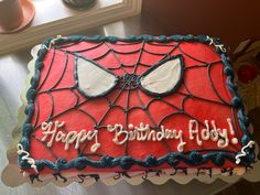 a spiderman birthday cake with the words happy birthday boy written on it