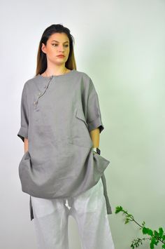 Linen shirt for Women, Gray Linen Shirt, Linen Clothing, Linen Fabric, Long Cardigans Womens, Linen Plus Size Clothing, Ladies Linen Tops 🤍Summer 100% linen shirt. Asymmetrical long loose shirt. Amazing asymmetric  top. ORGANIC oversize tunic, shirt. This high-low shirt is made out of 100% linen fabric.  This loose and comfortable stylish shirt for women is adding elegant and fashion touch in your everyday life. Perfect solution for your everyday outfit. Color: Gray Model on the picture is wear V-neck Tops With Pockets For Daywear, Casual Tunic Tops With Pockets, Plain Gray Shirt For Summer, Gray Plain Shirt For Summer, Plain Gray Summer Shirt, Summer Tunic Tops With Pockets, Gray Half Sleeve Tops With Relaxed Fit, Gray Shirt With Pockets For Spring, Casual Tunic Blouse With Buttons