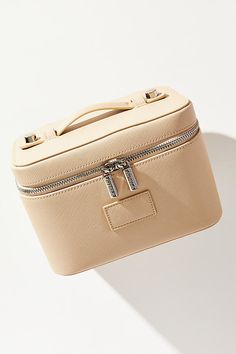 Stash your everyday beauty routine into the Mini Vanity Case - it's small enough to fit into your carry-on suitcase and includes the same divider system you know and love. | Collective Mini Vanity Case by ETOILE in Beige, Nylon/Polyurethane at Anthropologie Functional Rectangular Cosmetic Storage With Zipper, Functional Rectangular Cosmetic And Toiletry Storage With Zipper, Everyday Rectangular Cosmetic And Toiletry Storage With Zipper, Compact Travel Cases With Zipper Closure, Versatile Rectangular Case With Zipper Closure, Rectangular Cases With Zipper Closure For On-the-go, Portable Cosmetic And Toiletry Storage For Everyday Use, Modern Cosmetic Bag For Organization, Christmas Gift Ides