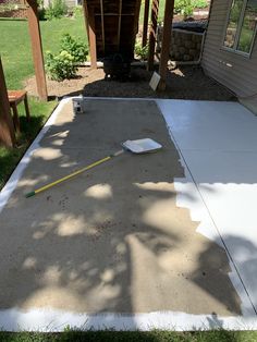 the concrete is being laid on top of the patio to be poured into the yard