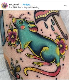 an image of a lizard with flowers on it's leg