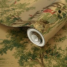 a roll of wallpaper with trees and flowers in green, brown, yellow and red colors