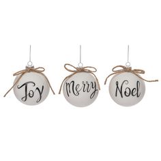 three christmas ornaments with the words joy, merry and noel hanging from twine strings