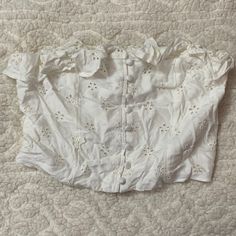 Never Worn, Tags Still On But Unsure Of Original Price. Small Flower Designs On Front, Smocked Back. Ruffles On Top And Buttons Going Down The Middle. Comes With Straps That You Can Put On If Desired. It’s A “Fancier” Tube Top :) Summer Cropped Tops For Daywear, Feminine Cotton Crop Top For Vacation, Spring Season Crop Top For Daywear, White Cropped Ruffle Tops, Fitted Crop Top For Spring Daywear, White Crop Top For Spring Daywear, White Fitted Crop Top For Daywear, White Cotton Crop Top For Daywear, Small Flower Design