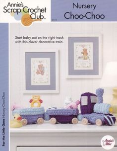 a toy train is sitting on top of a dresser in a child's room