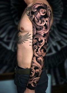 a man with a tattoo on his arm