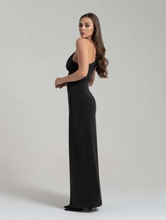 This sensationally chic gown is a top pick for important events. Tailored to accentuate the feminine silhouette, it has a one-shoulder neckline and a fitted waist with side drape detailing above a high slit skirt.  The elegant design is elevated with a diamanté brooch on the shoulder. It is cut from a luxurious stretch crêpe fabric that's been stitched to flatter, skimming the figure to a perfect finish.  Complement its timeless beauty with pared-back accessories for an elegant appeal. Hand wash only. Wash inside out with like colours. Do not wring or twist. Do not tumble dry. Iron at 160°C max or use press cloth. Do not bleach. Professional dry clean. Long Dress Black, March Birthstone Jewelry, Feminine Silhouette, Gifts For New Mums, Stretch Crepe, Pearl Jewellery Earrings, Crepe Fabric, March Birth Stone, Top Pick