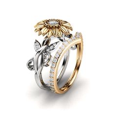 This Unique 14K Gold Diamond Sunflower Set Engagement Ring features a unique setting made of a solid 14K gold set with a brilliant diamond stone. A beautiful and delicate nature-inspired design that'll be cherished for a lifetime. SETTING: #SKU: CD-0150E Metal: 14K White & Yellow Gold (As In Photo) (Also Available in 14K Rose Gold, 14K White Gold, or 14K Yellow Gold - No Extra Charge) (Contact Us For Sizes Not Listed) Certificate: CJC (Camellia Jewelry Certificate) MAIN STONE: Type: Natural Diam Sunflower Wedding Rings, Sunflower Engagement Ring, Girlfriend Ring, Sunflower Ring, Sunflower Jewelry, Floral Engagement Ring, Black Diamond Engagement, Flower Engagement Ring, Black Diamond Ring Engagement