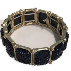 Just In Time For The Holidays This Black Bling Bracelet. It’s Shiny But Not Tacky! The Bracelet Has 12 Black And Gold Panels Connected By 2 Stretchy Strings. It’s 7 Inches Long And 3/4 Inches Wide. Will Look Great With An Evening Dress Or A Pair Of Jeans And A T-Shirt. New, Never Used. Great For Bundles. Adjustable Hand-strung Black Stretch Bracelet, Luxury Black Multi-strand Jewelry, Bohemian Black Multi-strand Bracelets, Luxury Black Hand-strung Beaded Bracelets, Luxury Black Tarnish-resistant Bracelet, Stretchy Bracelets, Womens Jewelry Bracelets, Looks Great, Evening Dresses