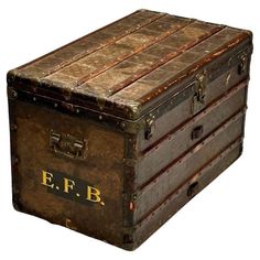 Louis Vuitton, Steamer Trunk, Distressed Brown Leather, Monogram Canvas, France, Early 20th Century Large vintages steamer or luggage trunk by notorious French fashion house, Louis Vuitton. This example is monogrammed with the original owner's initials. This piece maintains several original interior fittings. Circa 1920s/1930s H22.25" W 36" D 22.25" Monogram Canvas, Leather, Brass France, c. 20th C. gHLS Luggage Trunk, Lv Soft Trunk, Lv Steamer Trunk, Goyard Trunk, Antique Louis Vuitton Trunk, Hard Suitcase, Antique Steamer Trunk Hardware, Box Maker, Louis Vuitton Trunk