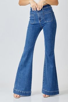 The Century Denim Jeans feature a sophisticated dark wash with a stylish flare leg, perfect for a modern yet timeless look. These jeans offer a flattering silhouette that elongates the legs, making them a versatile addition to any wardrobe. Ideal for dressing up or down, the Century Denim Jeans are a chic choice for any occasion. Fabric Content: 80% Cotton 18% Polyester 2% Spandex Chic Night Out Outfit, Jeans Website, Patches Fashion, Night Out Outfit, Trouser Style, Swimwear Girls, Bell Bottom, Hoodie Top, 70s Fashion