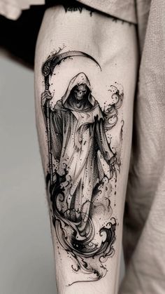 a man's leg with a tattoo on it that has an image of the virgin mary