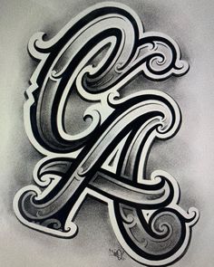 an artistic letter with swirly designs on the upper and lower letters in black ink