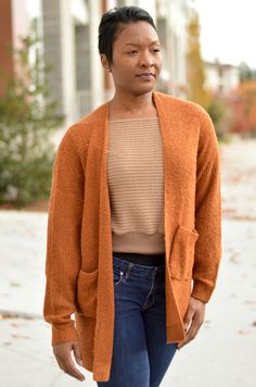 Add this rust colored cardigan to any ensemble for a nice cozy feeling. Two Pockets Model is wearing a Small Rust Brown Cardigan Outfit, Winter Orange Cardigan With Buttons, Brown Relaxed Fit Cozy Cardigan, Orange Buttoned Winter Cardigan, Rust Cardigan, Colored Cardigans, Cozy Feeling, Rust Color, Knit Cardigan