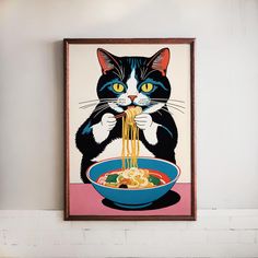 a black and white cat eating noodles from a blue bowl