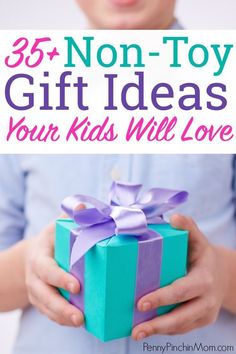 a child holding a present box with the words, 33 non - toy gift ideas your kids will love