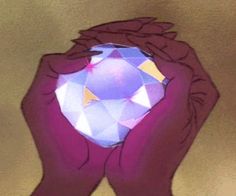 a person holding a crystal ball in their hands