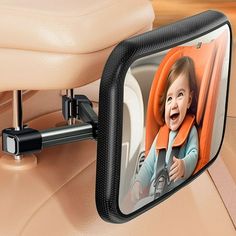 a child's car mirror with an image of a baby in the back seat