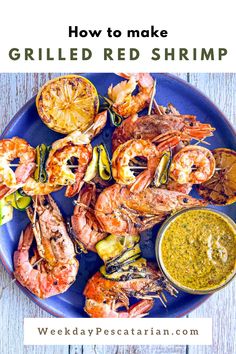 grilled shrimp on a blue plate with dipping sauce