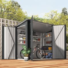 an outdoor storage shed with its doors open and a bicycle in the center, next to a potted plant