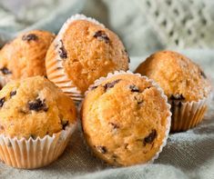 several muffins sitting on top of a cloth