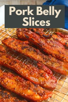 pork belly slices on a cooling rack with text overlay that reads pork belly slices