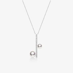 18K white gold Akoya saltwater cultured pearl Size: one is 5.0-5.5mm, another one is 6.5-7.0mm Weight of diamonds: 18 diamonds, around 0.13 carat in total Chain length: 45cm (adjustable) Total weight: around 2.79g Handpicked of every pearl, only the top 1% of pearls are selected Handcrafted Lifetime warranty White Diamond Necklace With Pearl Chain, White Pearl Diamond Necklace With Pearl Chain, Classic Akoya Pearl Diamond Necklace For Anniversary, Timeless Diamond Pearl Necklace, Pearl White Pearl Necklace With Diamond Accents, Classic White Gold Diamond Necklace With Pearl Chain, Luxury Akoya Pearl Necklace With Diamond Accents, Formal White Gold Diamond Necklace With Pearl Chain, Classic Akoya Pearl Necklace With Brilliant Cut