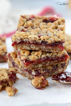 three pieces of fruit and oatmeal bars stacked on top of each other